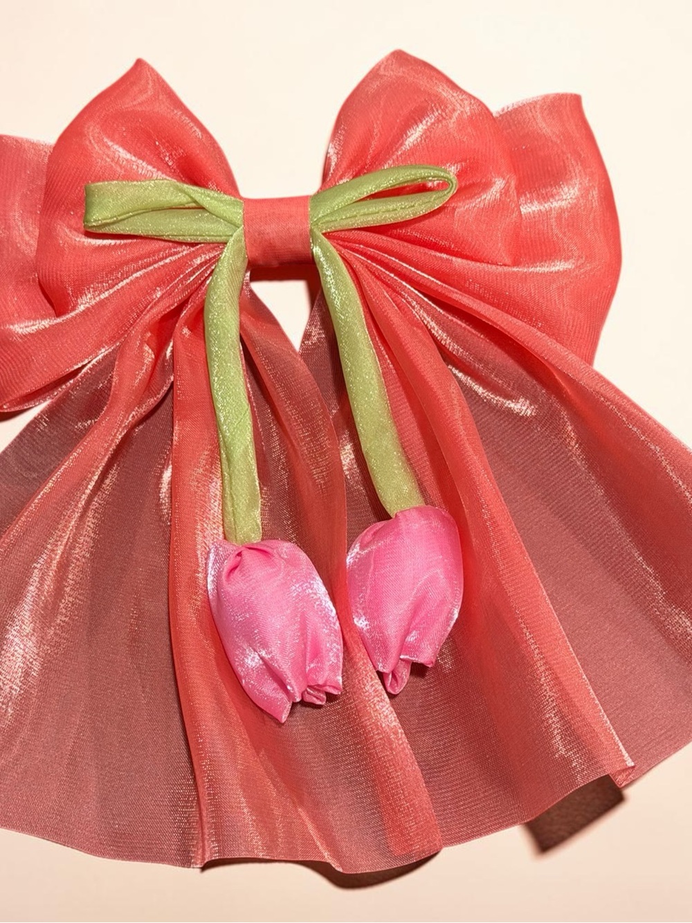 Shiny Coral Organza Bow with Pink Tulip Accents